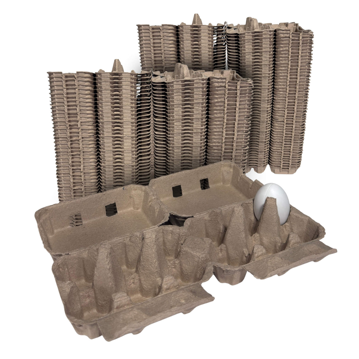 Stacks of brown egg cartons with a single white egg on a white background