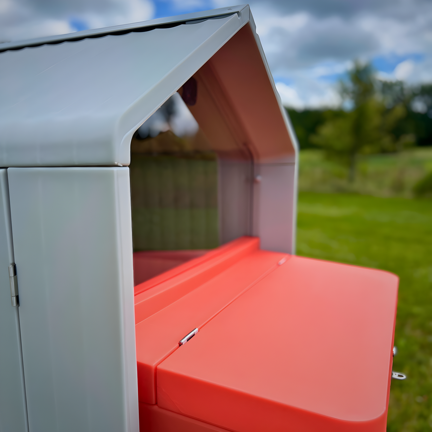 Hatching Time Smart Coop. Top of coop can be seen with nesting box opening visible.
