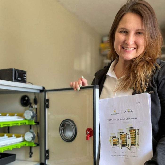 Hatching Time. A woman can be seen next to CT series incubator while holding a User manual.