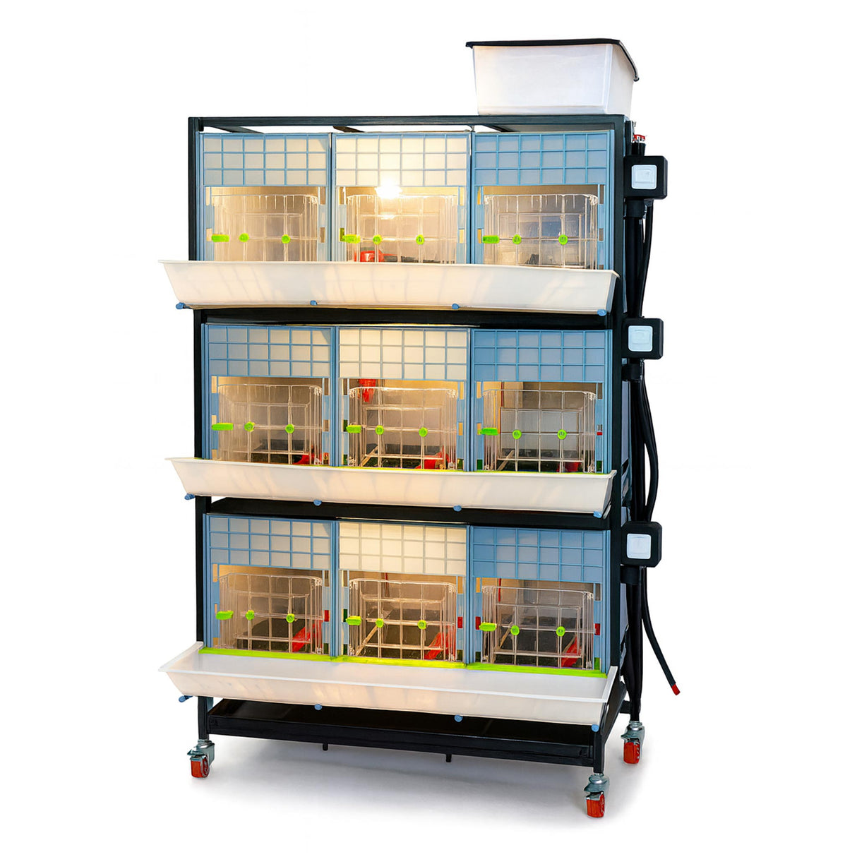 Hatching Time Cimuka 3 Layer 15 Inch Brooder front visible with LED light on. Feeding trough is located on front of brooders. Clear plastic doors with locks can be seen. Heater thermostat visible on side of brooders. Brooders are on Metal frame with rolling casters for mobility.