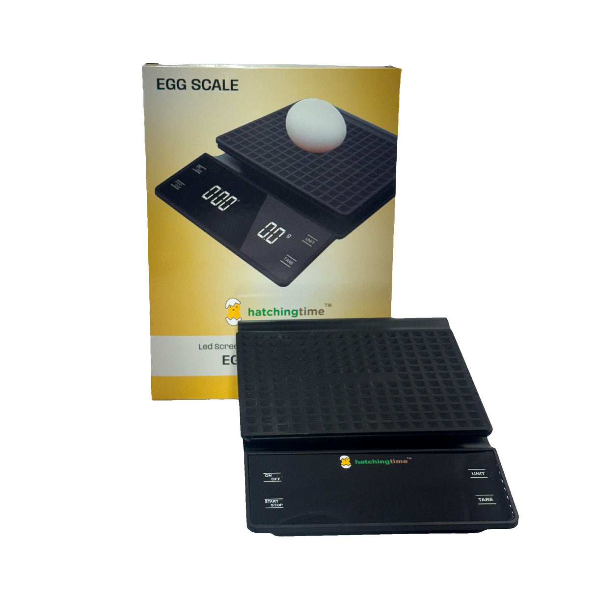 Digital egg and kitchen scale slightly right with packaging – front angled view