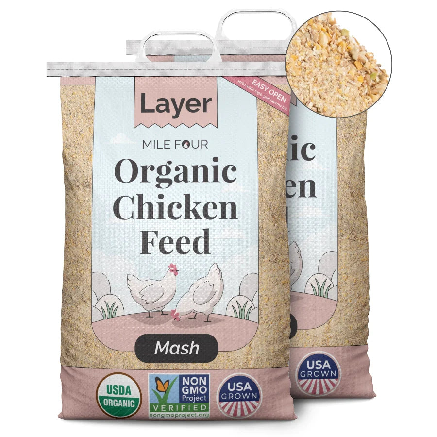 two large bags of Mile Four Layer Organic Chicken Feed Mash