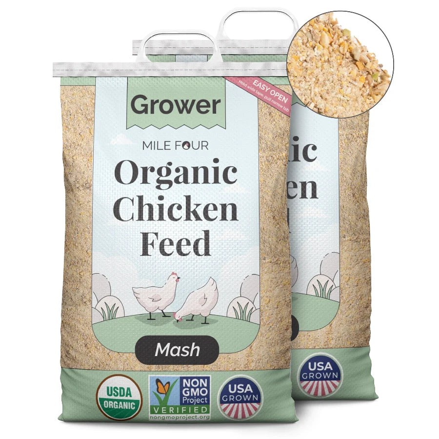 two large bags of Mile Four Organic Chicken Grower Feed mash