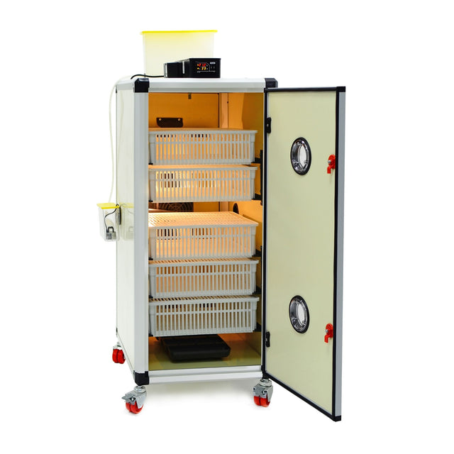 Hatching Time Cimuka. Image shows an open HB incubator with Hatching baskets inside. Digital controls can be seen on top in front of water reservoir for Humisonic Humidifier.