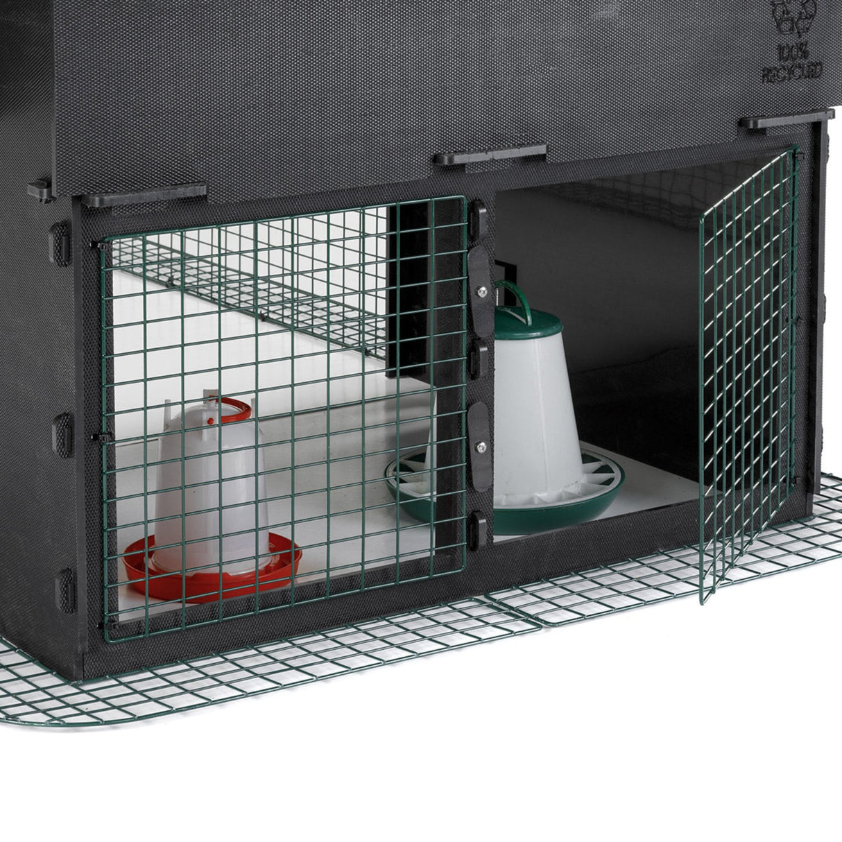 Hatching Time Nestera. Penthouse Coop bundle underneath can be seen with feeders and waterer under raised area for a safe place for chickens to hide and relax.