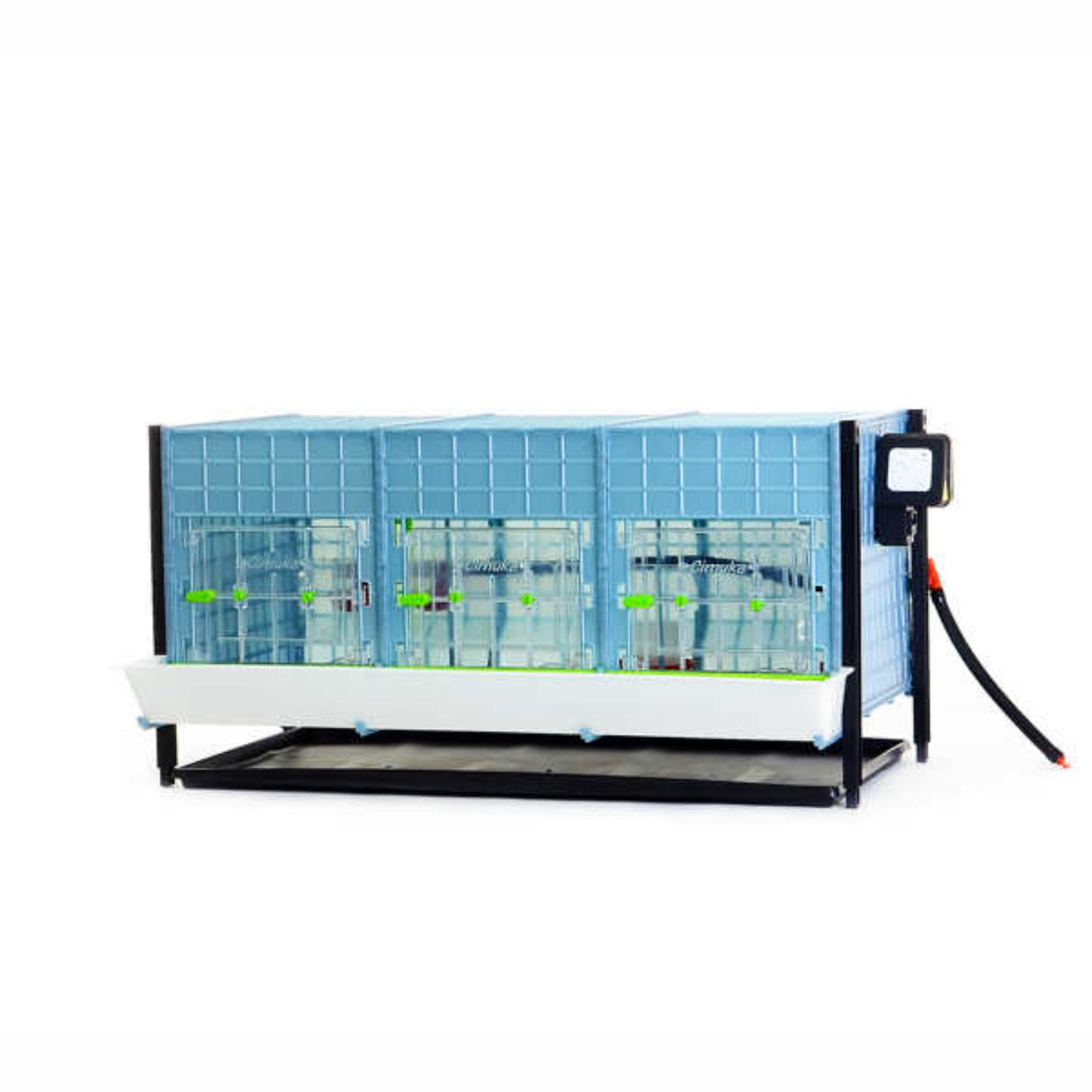 Hatching Time Cimuka Front view of layer addition for 15 inch chick brooder system. Front has feeder trough mounted, manure tray is visible under brooder. Thermostat is visible on side of brooder.