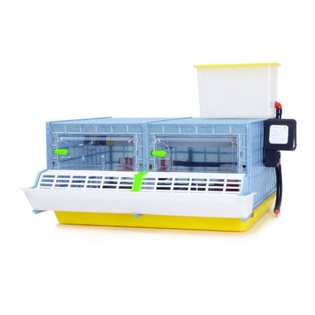 CB25 2 Section 9.5 inch Chick Brooder - Cimuka - Hatching Time Front of brooder enclosure shown. Not on a frame or wheels. Water tank visible on top of brooder connected to drinker system. Front shows feeding trough and locking doors of brooder system. Temperature thermostat can be seen on side of brooder to control interior temperature.