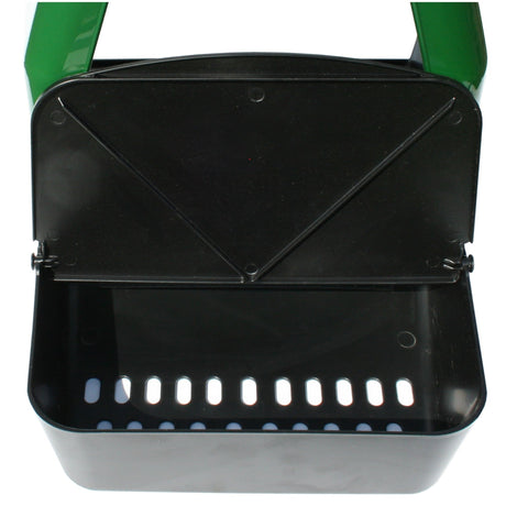 Hatching Time Cimuka. Close up view of egg collection tray. Tray is open showing space for eggs to be collected when laid.