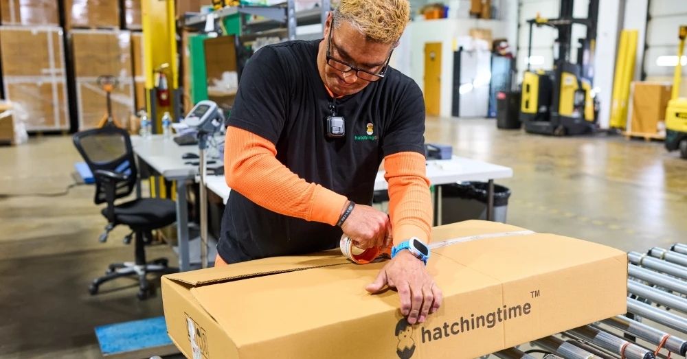 Hatching Time team member preparing a poultry equipment order at the Delaware warehouse