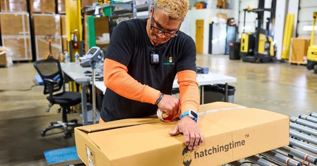 Hatching Time team member preparing a poultry equipment order at the Delaware warehouse