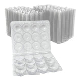 Clear plastic egg cartons with a large stack of similar cartons in the background.
