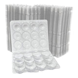 Clear plastic egg cartons with a stack of similar cartons in the background.
