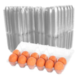 brown eggs in egg carton in front of stack of egg cartons