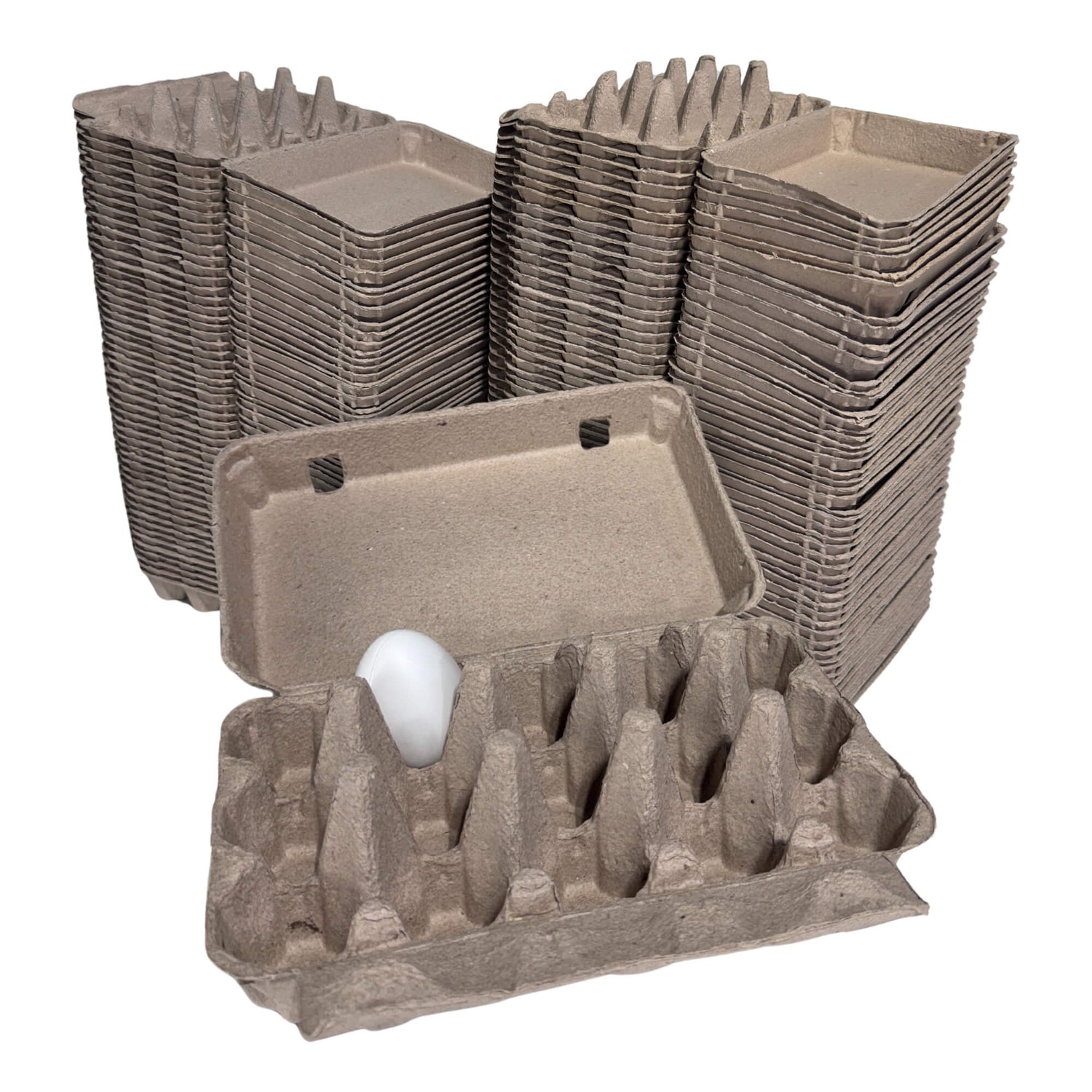 Stacks of cardboard egg trays with a single egg on a white background