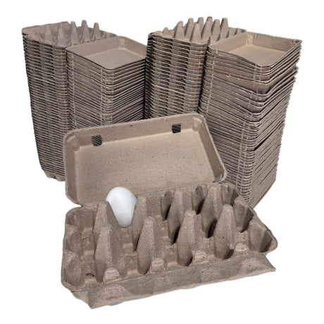 Stacks of cardboard egg trays with a single egg on a white background