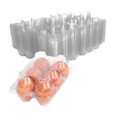 Clear plastic egg cartons with eggs on a white background