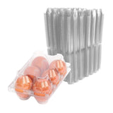Carton of eggs with a stack of clear plastic egg trays on a white background
