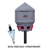 Hatching Time Coopworx 80 lb feeder silo can be seen in image with attached Stake mount.