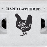 Image shows a chicken with text reading "Hand Gathered Laid Local"