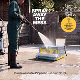 Person power washing a Cimuka by Hatching Time plastic quail cage, with instructions to dry completely before returning birds