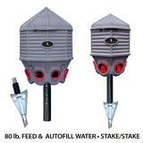 A 80lb Feed Silo with a Stake Base next to a 8 Gallon Water Silo with a Stake base by Hatching Time 