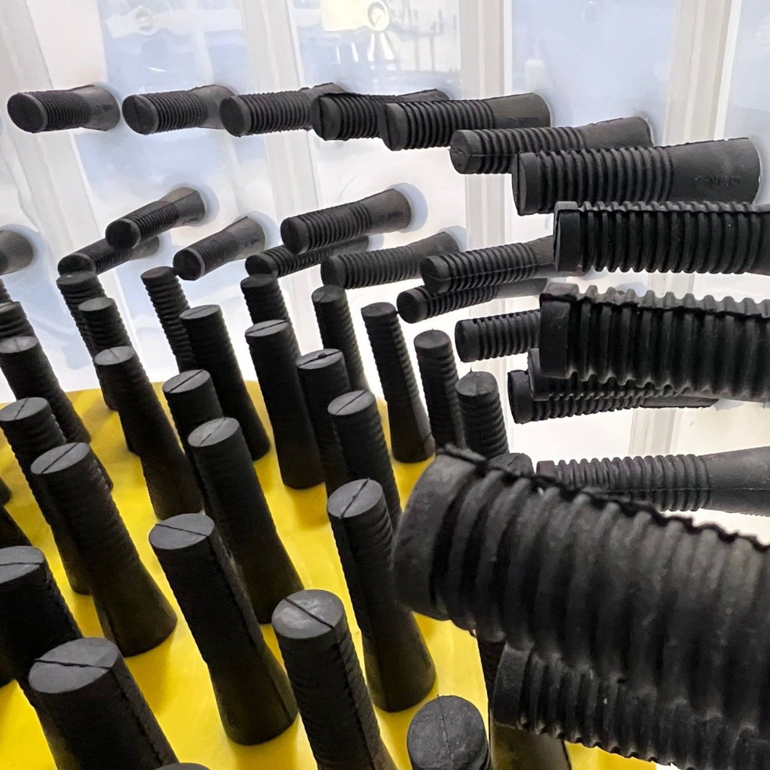 Hatching Time Cimuka. Close-up view of natural rubber plucker fingers. Interior view of xl turkey feather plucker.