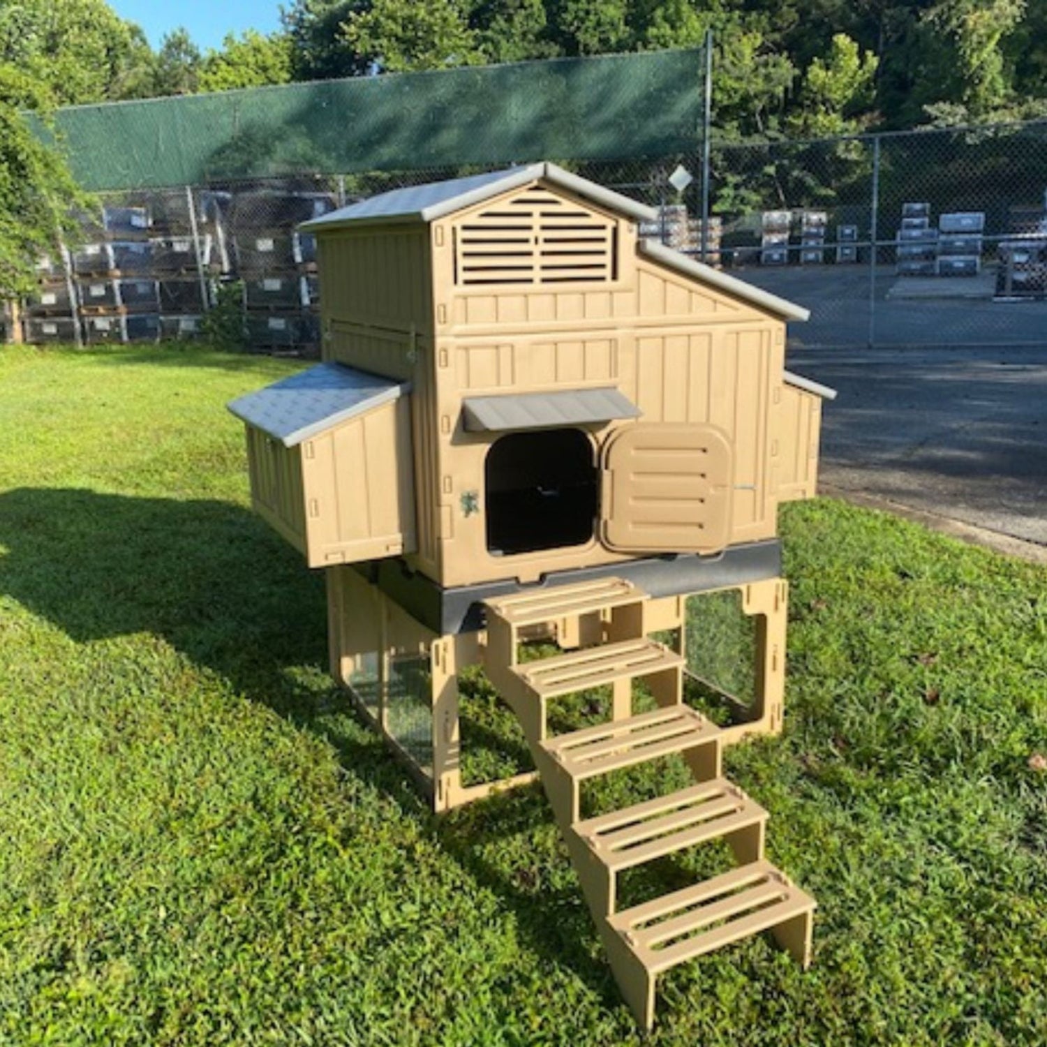 Stand and stairs for Formex Standard and Large chicken coop. Image showing assembled coop stand and stairs under Large Chicken Coop.