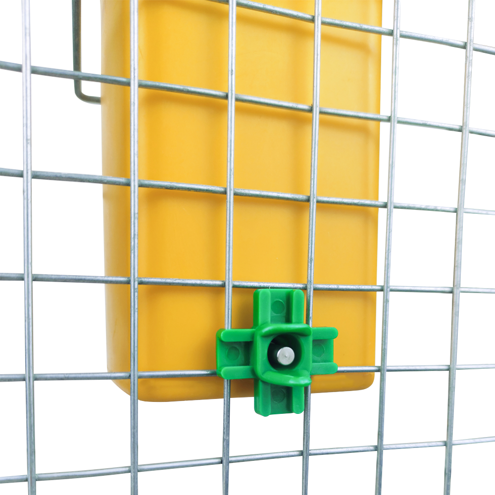 DIY poultry waterer with a yellow container attached to wire mesh, featuring a green horizontal nipple drinker for chickens.
