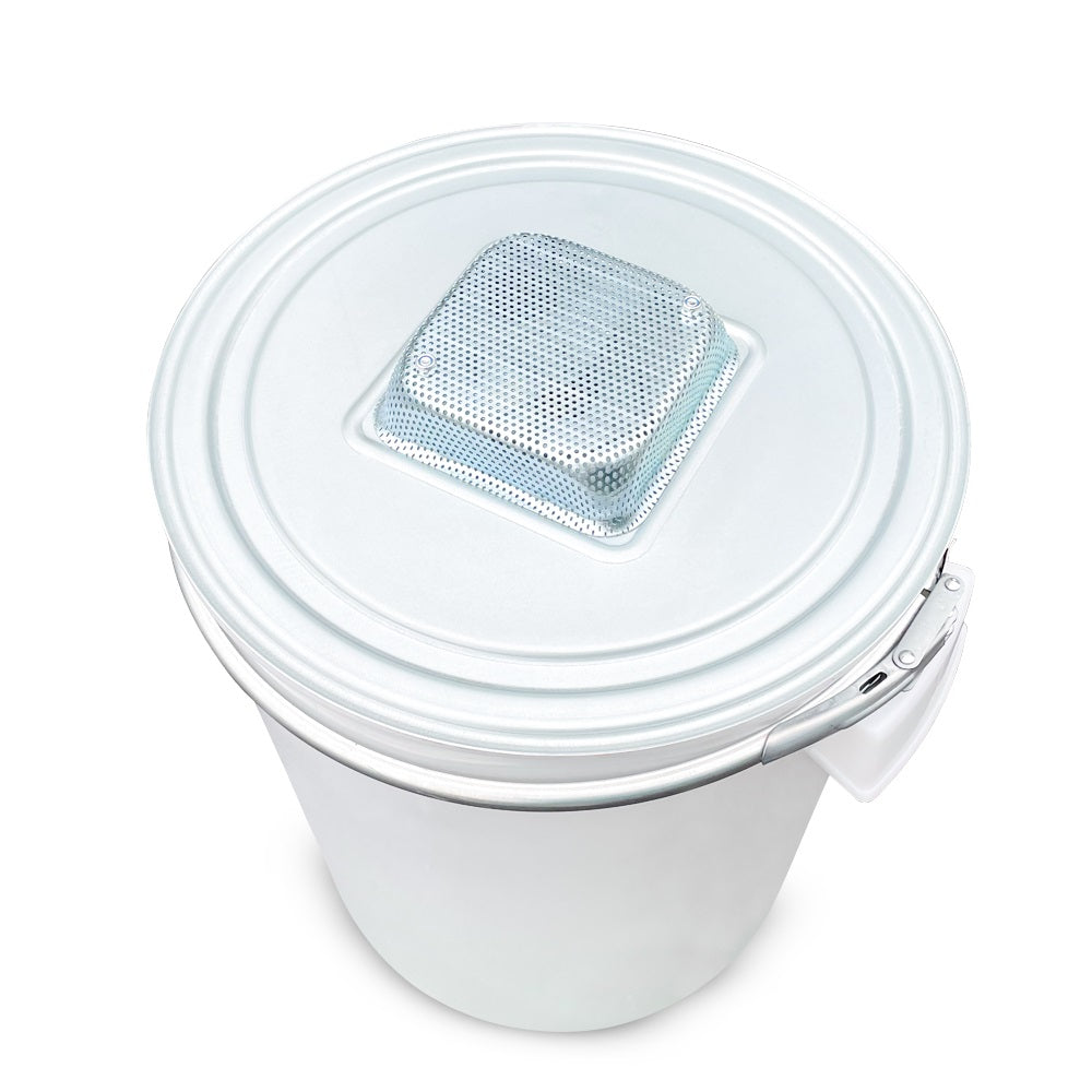 Top view of the Farm Mill 50 Feed Crusher’s 50-liter plastic collection bucket showing the metal lid with a perforated ventilation mesh