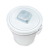 Top view of the Farm Mill 50 Feed Crusher’s 50-liter plastic collection bucket showing the metal lid with a perforated ventilation mesh