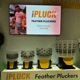 Hatching Time. Feather pluckers can be seen on stand in front of TV with ipluck technology shown.