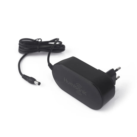 Black power adapter with cable on a white background, featuring the Humisonic logo.