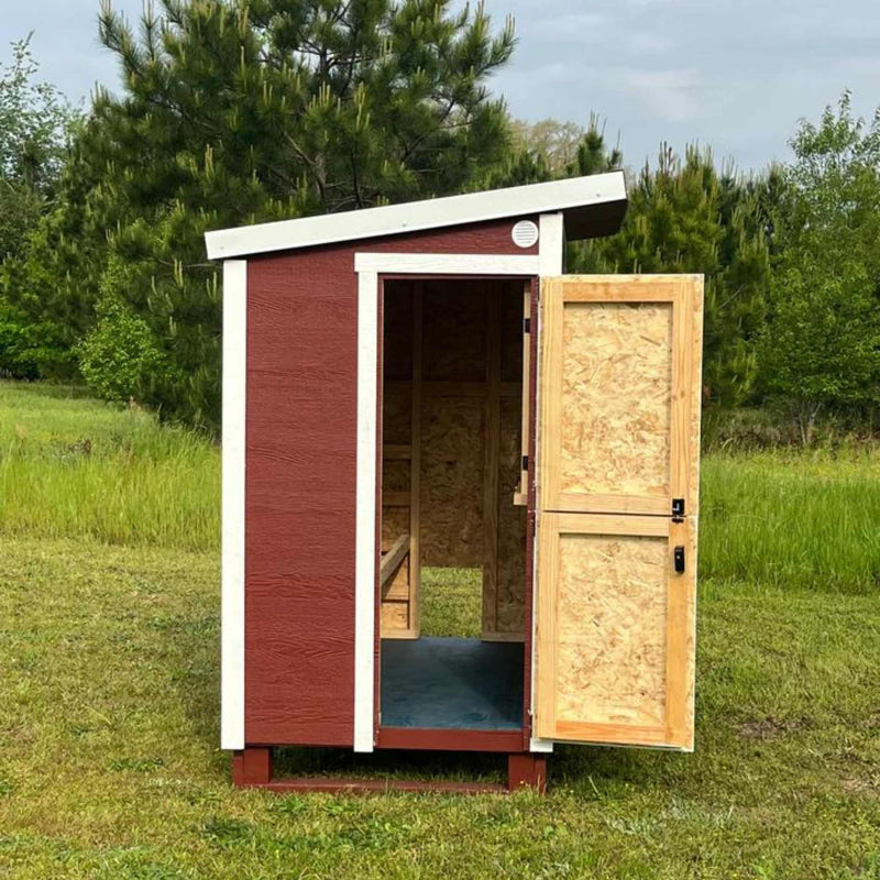 Hatching Time OverEZ Side view of Walk-in chicken coop with door open to see interior spacing.