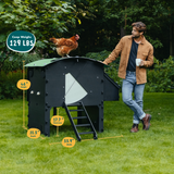 Hatching Time Nestera. A man is leaning on sturdy Large lodge chicken coop with chicken on top. Infographic shows dimensions, 46 inches high, 55.9 inches wide, 31.5 inches deep, 17.7 inches ground clearance. Coop weighs 129 pounds.