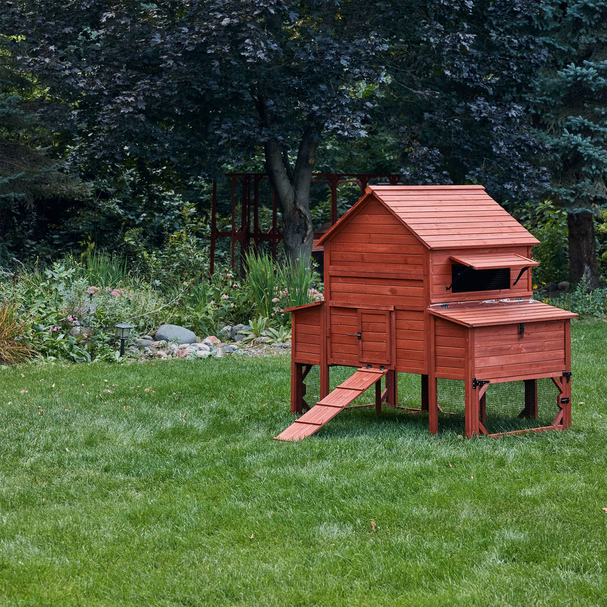 Rhode Island chicken coop with raised wooden shelter and attached outdoor run