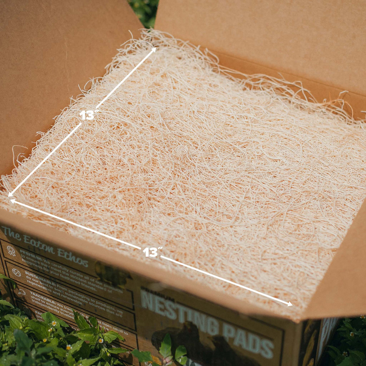 Premium Nesting Pad measuring 13 x 13 inches, designed to fit standard chicken nesting boxes and laying areas.