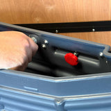 a Silo Feeder (Wall Mount) being placed on the mounting bracket 