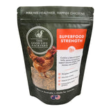 Superfood Strength Package of 'The Good Life Backyard' chicken feed with a chicken on a white background