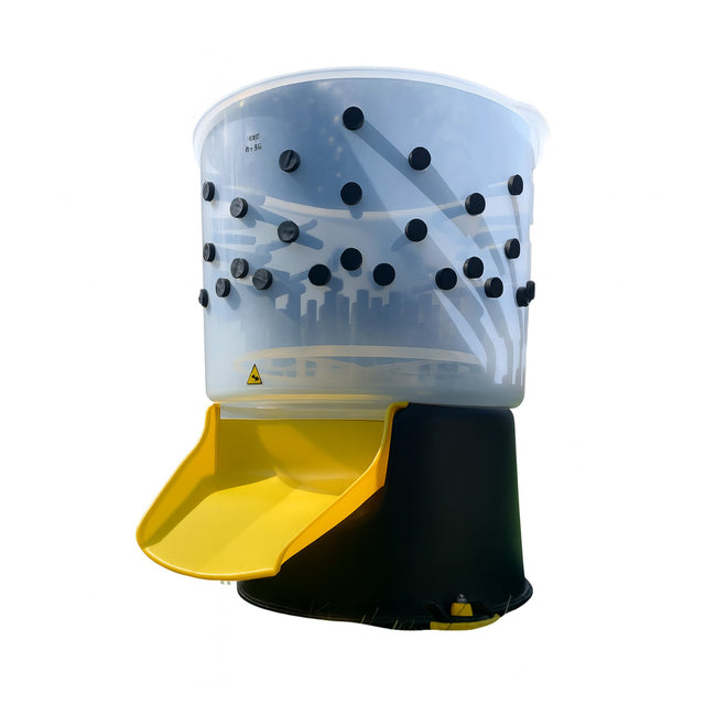 Hatching Time Cimuka. Turkey feather plucker can be see in image, feather chute can be seen in front. Natural rubber fingers are attached to food grade plastic drum.