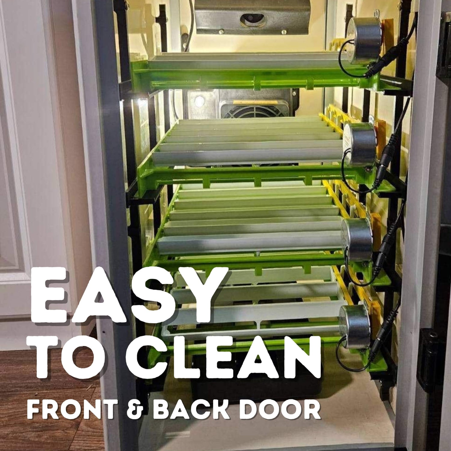 Hatching Time Cimuka CT120 Incubator. Image shows open incubator with setting trays and automatic turners. Back door can be seen through the incubator and image text reads "Easy to clean front & back door."