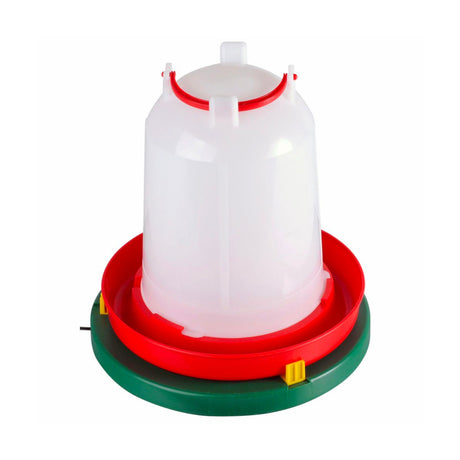 Poultry feeder with red base and clear top on a white background