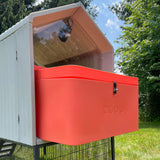 Hatching Time Smart Coop. Top of coop can be seen with nesting box opening visible.