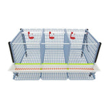 Hatching Time Cimuka. TYK40 15” Chicken cage layer addition. Image shows chicken cage from front and above. Roof and front walls are removed to show inside of cage. Roll out egg trays can be seen on front under feeding trough. Automatic drinker system is seen on back wall of cage.
