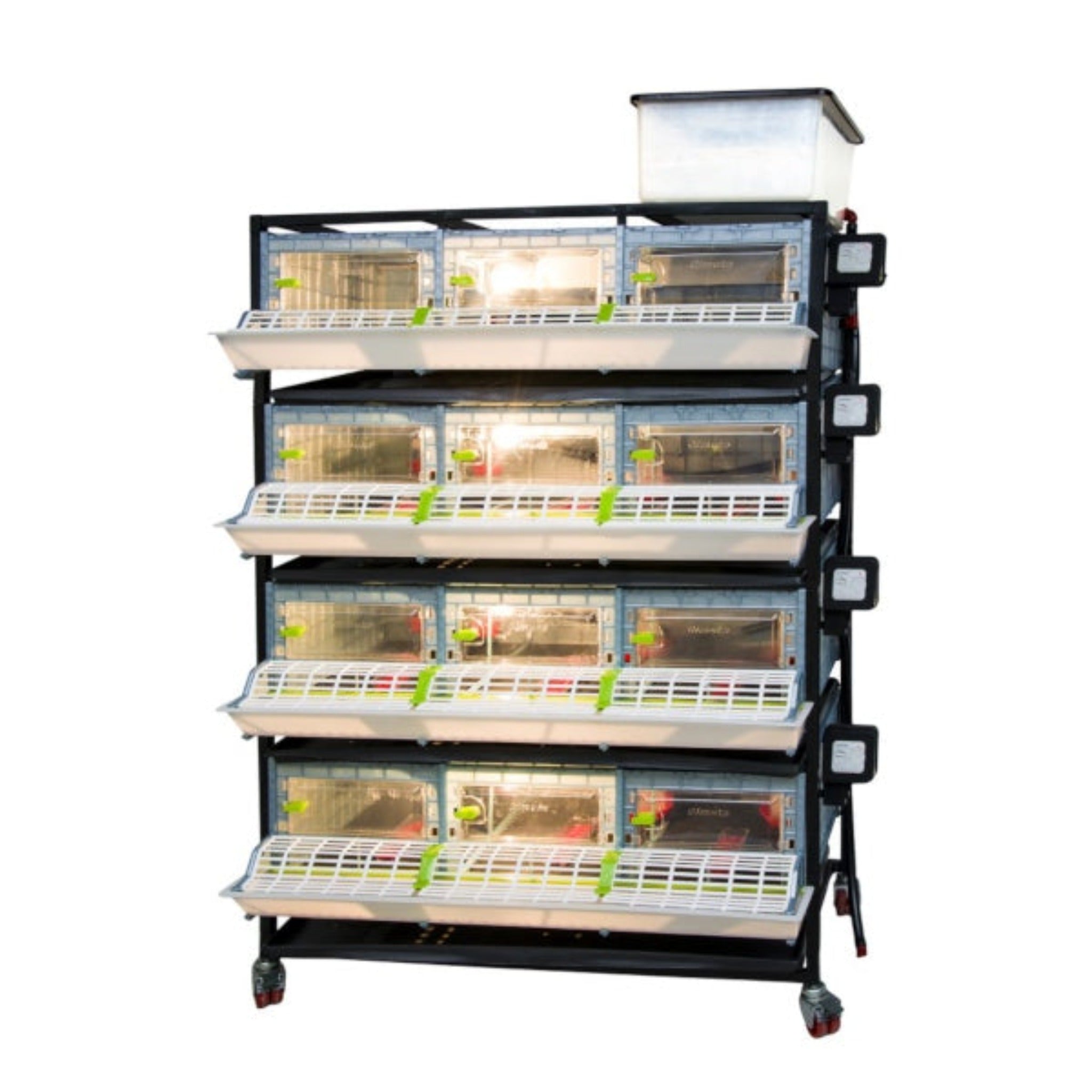 Hatching Time Cimuka 4 Layer 9.5 Inch Brooder front visible with lights on. Feeding trough is located on front of brooders. Clear plastic doors with locks can be seen. Heater thermostat visible on side of brooders. Brooders are on Metal frame with rolling casters for mobility.