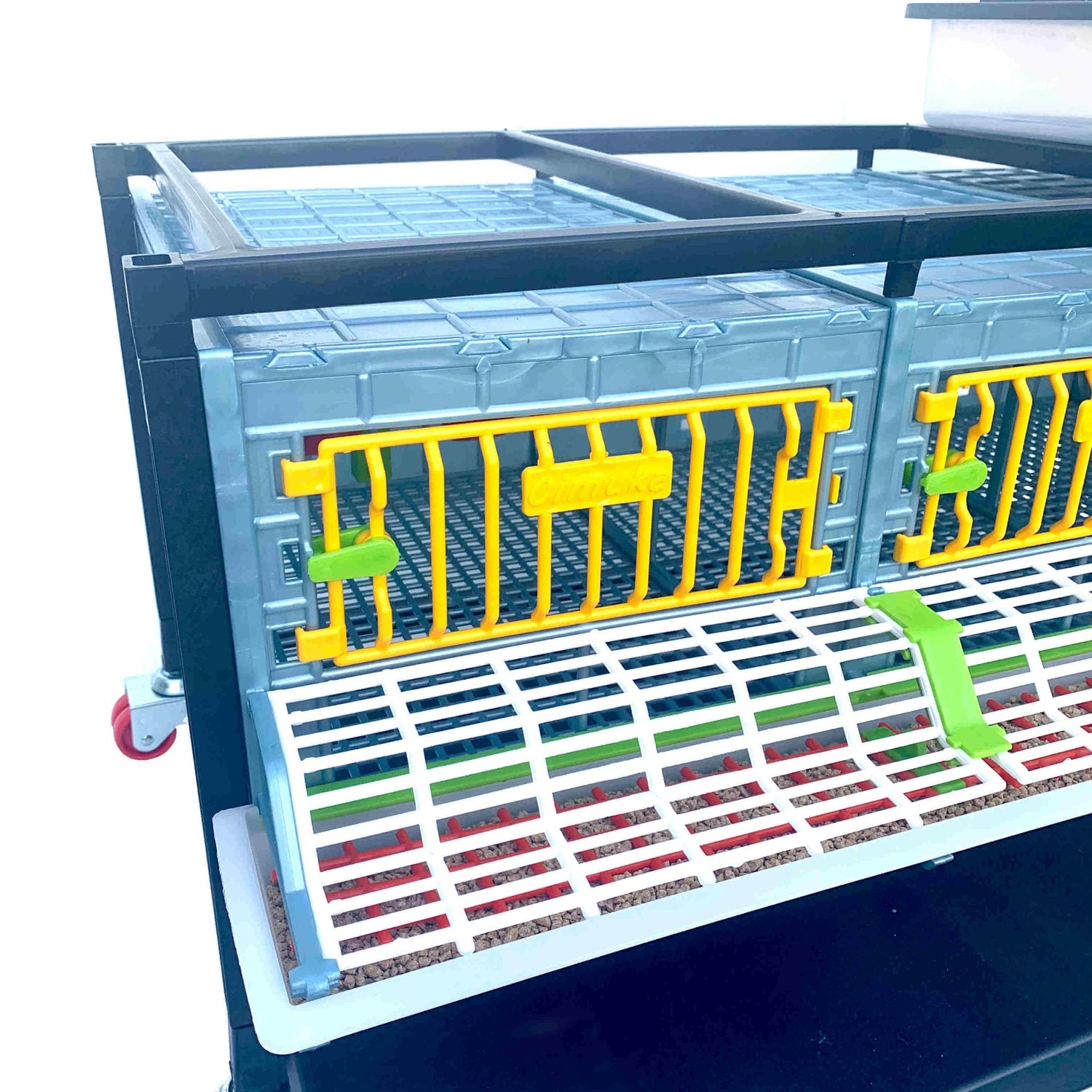 Hatching Time Cimuka 9.5" grow out pen GL25 feeding trough can be seen in front of grow out pen with cover.