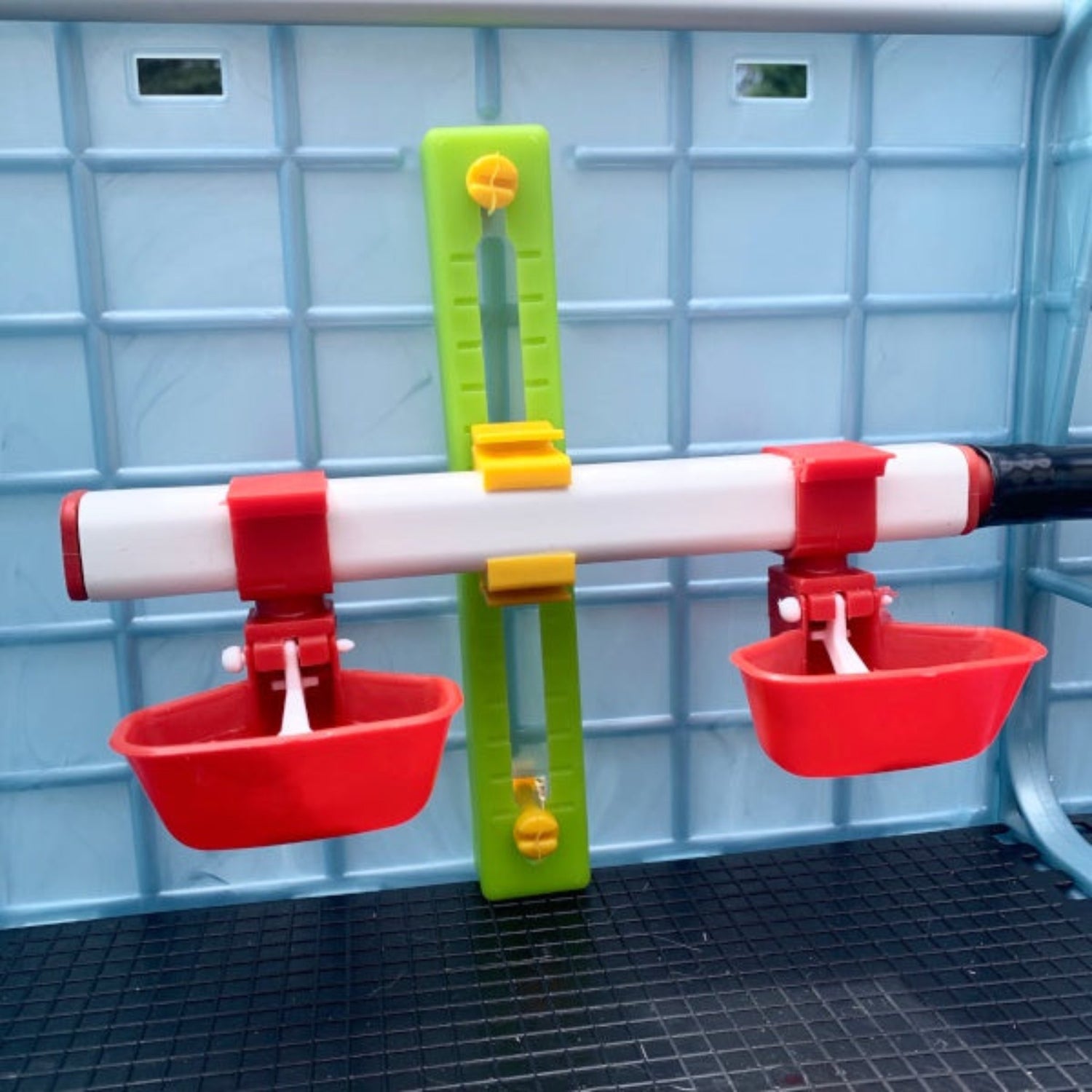 Adjustable drinker and cups in Cimuka 9.5 inch Chick Brooder - Hatching Time