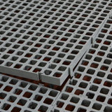 Hatching Time. Closeup view of interlocking flooring setup.