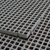 Hatching Time. Closeup view of interlocking flooring setup.