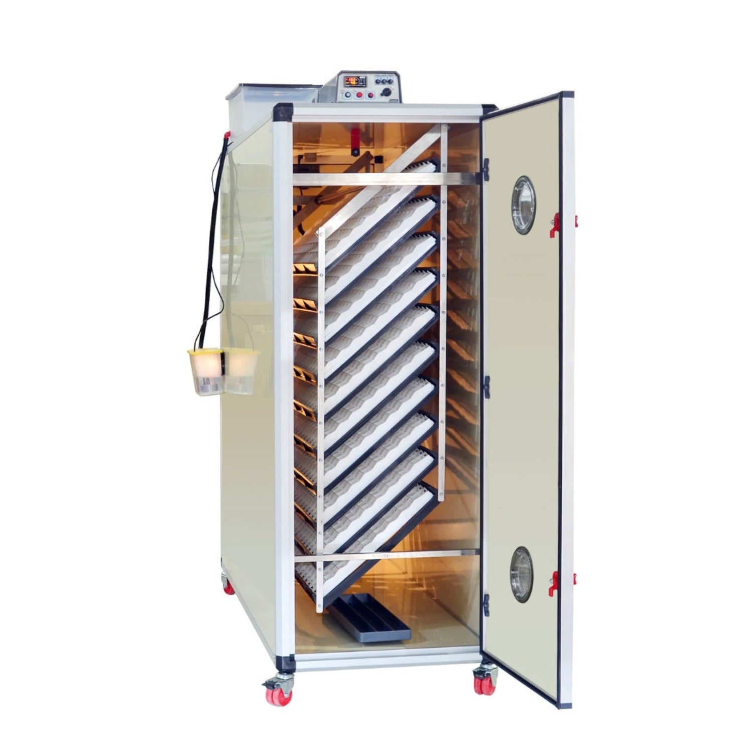 Hatching Time Cimuka. T1600S image shows incubator with open door with setting trays inside. Humidity Tray can be seen on floor of incubator. Digital control on top of incubator is in front of water reservoir tank connected to Humisonic Humidifier.