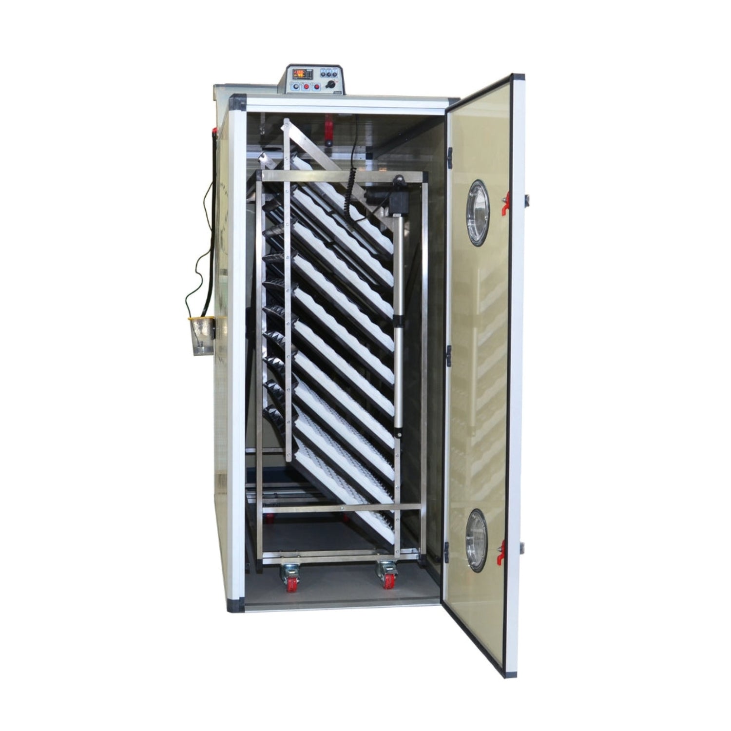 Hatching Time Cimuka. T1600SH shown with door open to show trolley-mounted setting trays inside incubator. Digital controls can be seen on top of incubator. Humisonic humidifier is on side of egg setter and hatcher.
